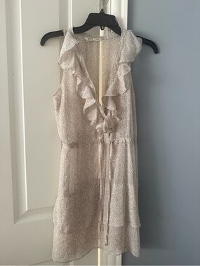 Sleeveless Ruffle V-Neck top in Light Beige -